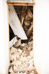 Debris and houses destroyed by a natural disaster.