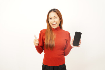 Happy young woman smiling widely and giving a confident thumbs up gesture while holding up a blank smartphone.