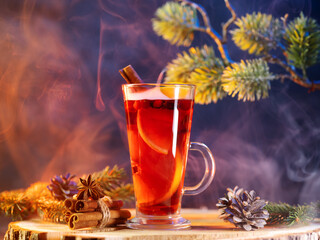 Mulled wine glass on a Christmas decorated background