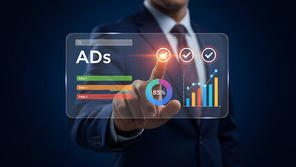 Businessman interacting with digital ads dashboard on transparent screen