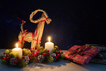 Naklejka premium Julbock Christmas Straw Goat and Candles