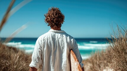 A serene image of a young man walking towards pristine waves with a surfboard, capturing the essence of summer, adventure, and the carefree spirit of beach life.