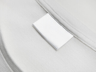 Blank White Clothing Label on White Fabric