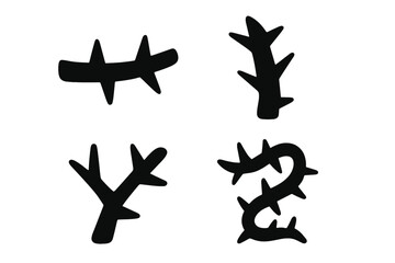 Four abstract black thorny branches and spiky organic shapes isolated on white