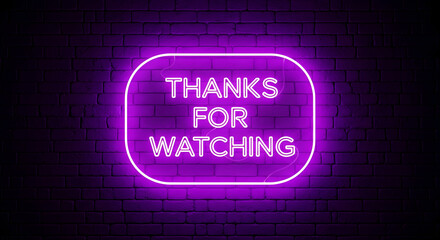 Purple Neon Sign Saying Thanks For Watching on Brick Wall.