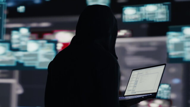 Professional spy compromising cyber security through malware and viruses, digital threat of hacking with unauthorized intrusion into secure networks. Leading to quantum threat and risk. Camera A.