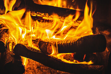 Flames burning a bonfire with coals, fireplace, close-up