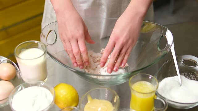 Cook Mixes Flour With Eggs For Pancake. Preparing Breakfast In Home Kitchen. Kneading Dough With Whisk For Baking Cake. Chef Cook Dessert Mixing Dough. Pancake Culinary. Whisk Mixing Dough.