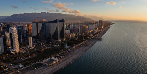 Drone aerial panoramic view of evening sunset at Batumi City, Georgia