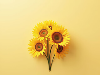 Bright sunflowers arranged beautifully on yellow background