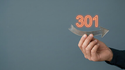 301 redirect arrow held by hand indicating website redirection and SEO update with glowing numbers