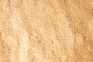 Crumpled brown kraft paper with dirty old stains