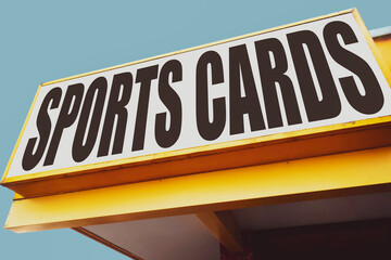 Old worn sports cards sign