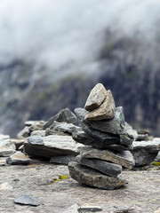 Stone cairn standing on mountain top in norway