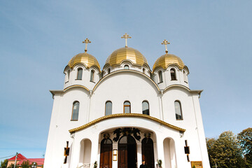 Orthodox church architecture with golden domes and crosses