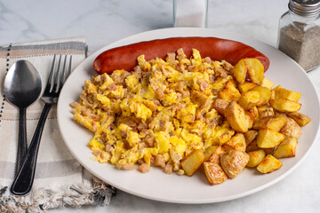 scramble eggs and corn beef hash  with  smoked sausage