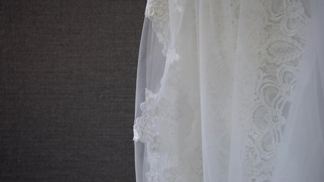 Close Up Lace Veil Against Wall, Delicate Floral Embroidery And Sheer Tulle Draping In Soft Natural Light, Bridal Detail Study For Couture