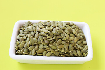 Delicious peeled green pumpkin seeds