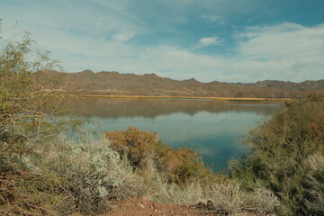Bill Williams River beautiful mountains reflecting on calm water in Arizona