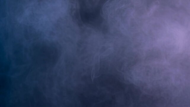 Wispy White Smoke Against Blue and Purple Gradient Background