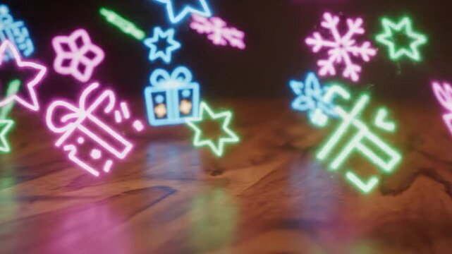 Christmas gift boxes and snowflakes on wooden table