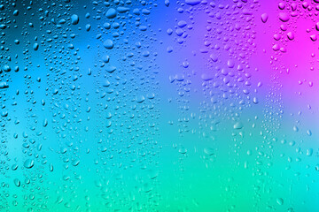 Glass surface with water drops, closeup view
