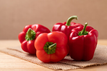 Red bell pepper or sweet pepper on wooden background