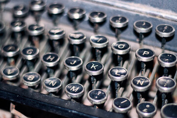View of an antique typewriter, with its buttons, letters, and functions. Very colorful and in good condition for use and collection. Recycling and reuse. nostalgia 
