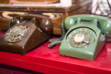 Antique wired transmitter or telephone used to call or communicate with other people, antique, communication, retro vintage, nostalgia, years.