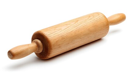 Wooden kitchen utensil used for flattening dough sits isolated against a bright background.