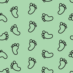 Seamless Pattern of Baby Footprints on Mint Green Background.