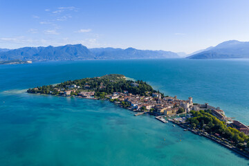 Fototapeta premium Aerial view of Sirmione peninsula on Lake Garda - Sirmione, Italy