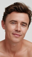 Obraz premium Fresh Skincare Inspired Portrait of Man with Natural Friendly Expression 