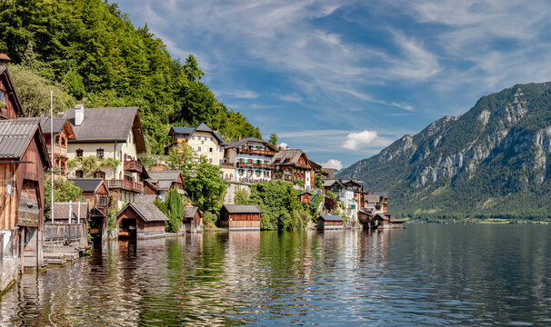 Hallstatt village with reflections located on the banks of the Hallstattersee lake located in the Salzkammergut region of Austria. Hallstatt is a UNESCO World Heritage Site, Hallstatt, Austria, Europe