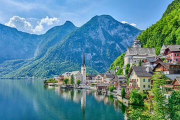 Fototapeta premium Hallstatt village with reflections located on the banks of the Hallstattersee lake located in the Salzkammergut region of Austria. Hallstatt is a UNESCO World Heritage Site, Hallstatt, Austria, Europe