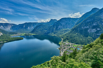 High angle view of Lake Hallstatt and surrounding mountains of Austrian Alps with the town of Hallstatt on the bank and town of Obertraun in distance, Salzkammergut, Hallstatt, Austria, Europe