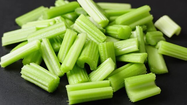 closeup of fresh green cut celery background
