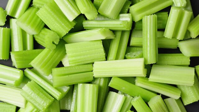 closeup of fresh green cut celery background