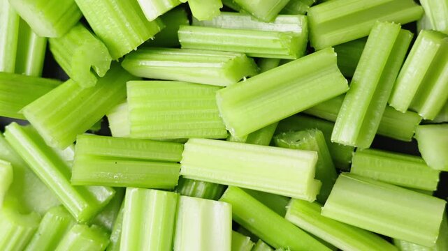 closeup of fresh green cut celery background
