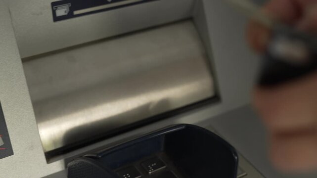 Hand Taking Money Cash From ATM Dispenser. Cash Withdrawal From Bank Machine Slot. ATM Giving Out Hundred Dollar Banknotes. Banking Cashpoint Transaction With Dollars