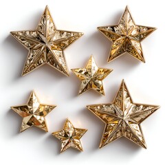 Fototapeta premium Six shiny gold stars of varying sizes are scattered on a plain white background creating a festive holiday or celebratory design element.