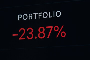 Fototapeta premium Portfolio showing negative percentage loss on financial display screen