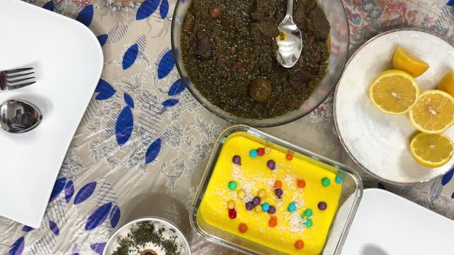 Persian dish Ghorme Sabzi aromatic herbs saffron rice traditional stew cuisine delicious gourmet fresh ingredients colorful dining lifestyle family gathering dinner Tehran Iran Asia ghormeh sabzi