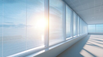 Obraz premium Bright Modern Office Space with Large Windows Allowing Natural Light to Shine Through and Creating a Spacious and Inviting Atmosphere