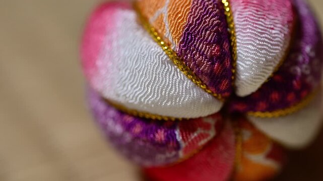 Traditional Japanese Temari Ball Close Up on Tatami Mat Right