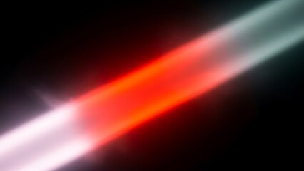 Abstract diagonal light streak with red glow on black background