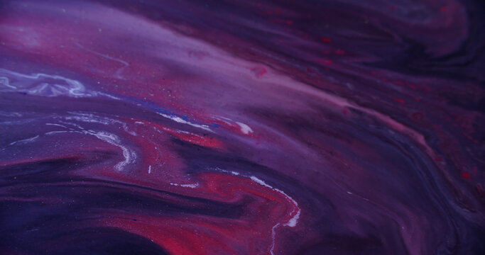 Ink spill. Marble texture. Defocused blue red purple colorful glitter water acrylic flow bright particles on abstract art background. - Powered by Adobe