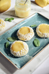 Lemon crackle cookies with lemon curd