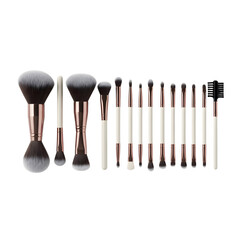 Professional dual-ended makeup brush set with rose gold and cream handles on transparent background