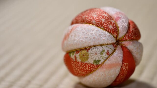 Traditional Japanese Temari Ball Close Up on Tatami Mat Right